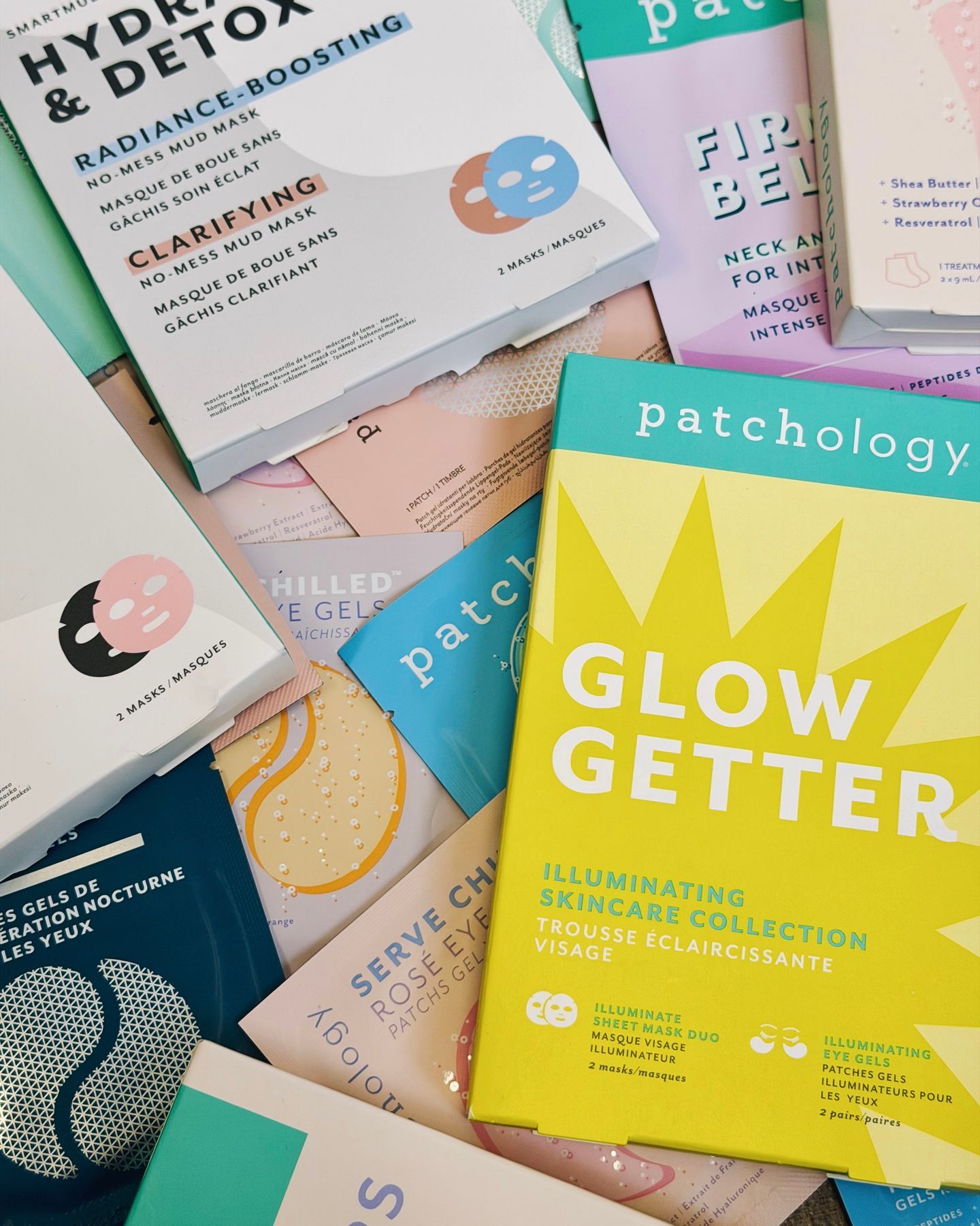 Overhead shot of a pile of Patchology brand face and eye masks